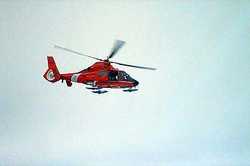 The Polar Sea's HH 65 helicopter supporting science operations during AWS 98.