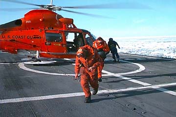Terry and Tim off loading from the chopper on the Polar Sea's flight deck.