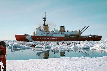 The Polar Sea in the ice. Both aft cranes can be seen with booms extended over the flight deck.