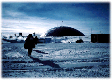 Carrying bags from the airfield to the station. The dome houses computer facilities, laboratories, and the cafeteria. Dorms are located outside of the dome.